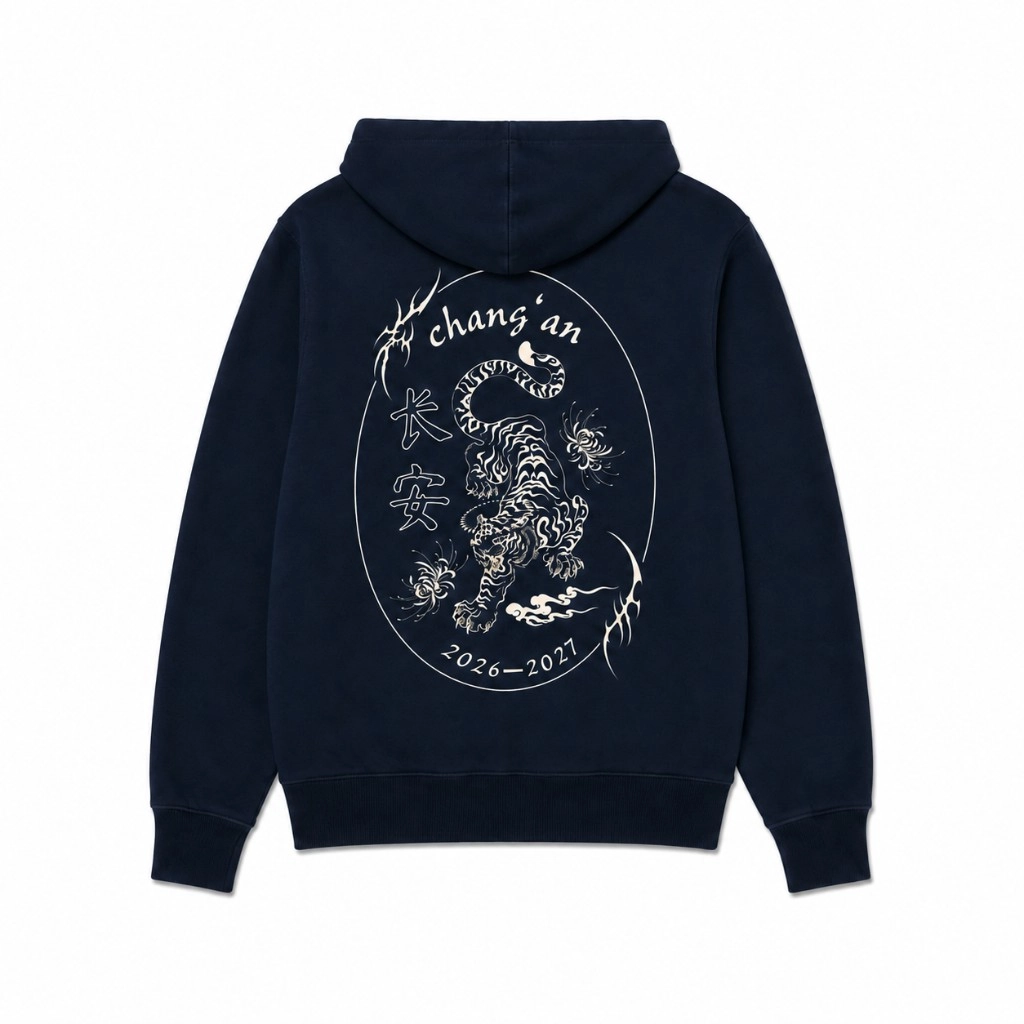 Back of a navy Club Chang'an hoodie with a cream tiger, floral details, Chinese characters, and 2026-2027 artwork